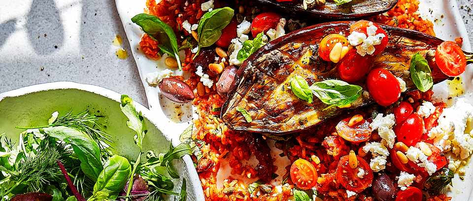 Roast puttanesca aubergines Roast puttanesca aubergines with Roast puttanesca aubergines with tomato rice & feta