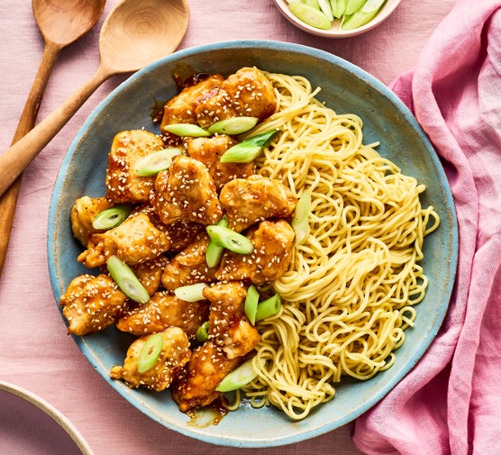 Crispy sesame lemon chicken in a bowl Crispy sesame lemon chicken in a bowl