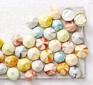 Rainbow rippled meringues