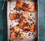 Pomegranate salmon in a roasting tin